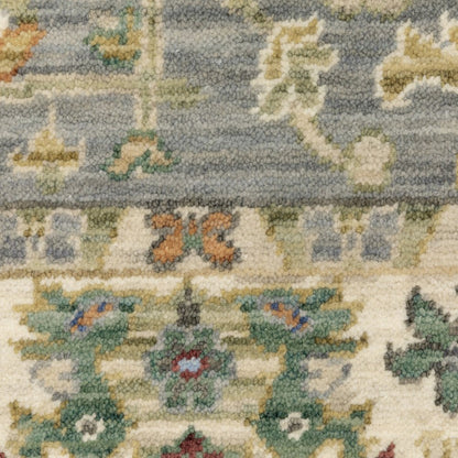 8' X 11' Grey Ivory Orange Teal Green Charcoal Blue And Red Oriental Power Loom Stain Resistant Area Rug With Fringe