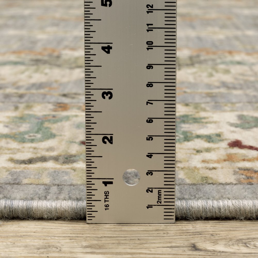 8' X 11' Grey Ivory Orange Teal Green Charcoal Blue And Red Oriental Power Loom Stain Resistant Area Rug With Fringe