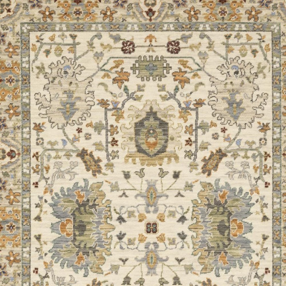 2' X 6' Ivory Grey Orange Green Blue And Red Oriental Power Loom Stain Resistant Runner Rug With Fringe