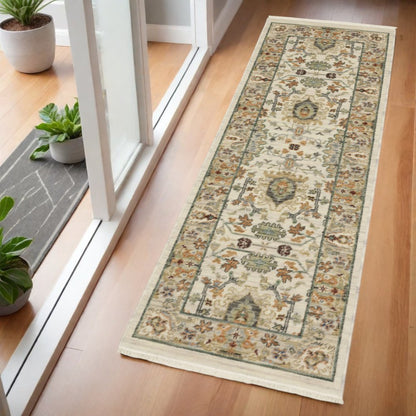 2' X 6' Ivory Grey Orange Green Blue And Red Oriental Power Loom Stain Resistant Runner Rug With Fringe