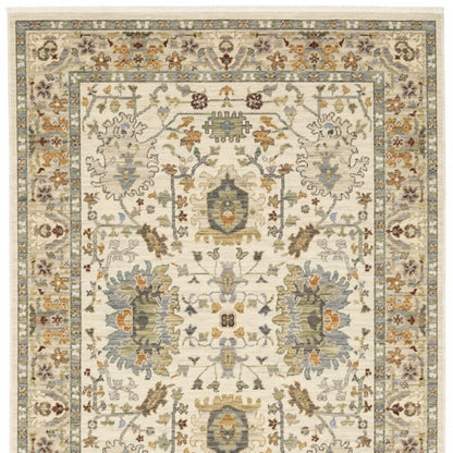 3' X 5' Ivory Grey Orange Green Blue And Red Oriental Power Loom Stain Resistant Area Rug With Fringe