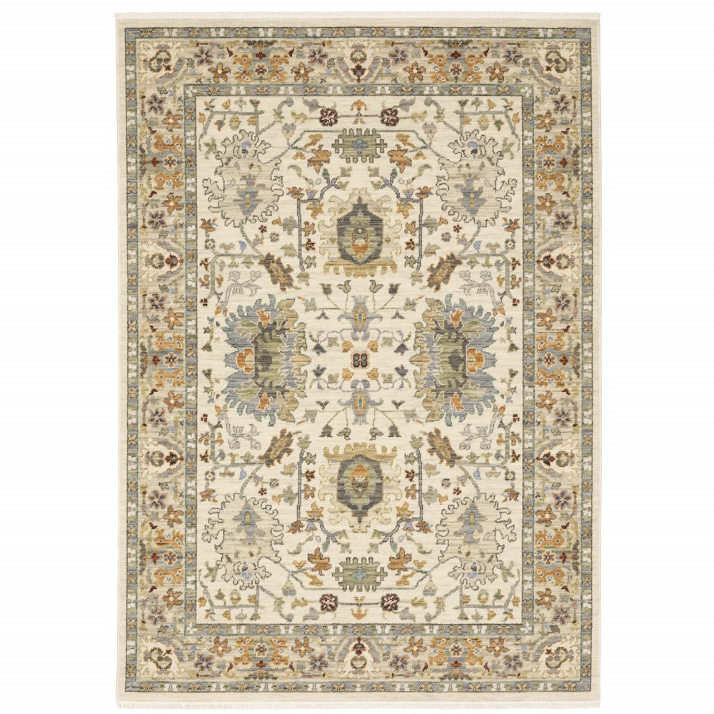 3' X 5' Ivory Grey Orange Green Blue And Red Oriental Power Loom Stain Resistant Area Rug With Fringe