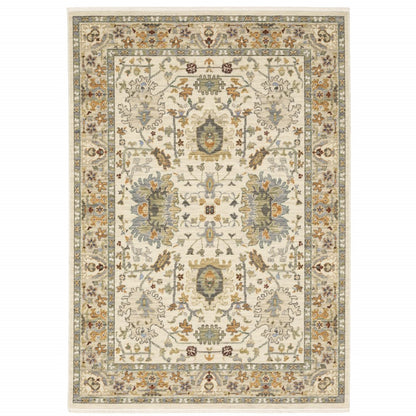 3' X 5' Ivory Grey Orange Green Blue And Red Oriental Power Loom Stain Resistant Area Rug With Fringe