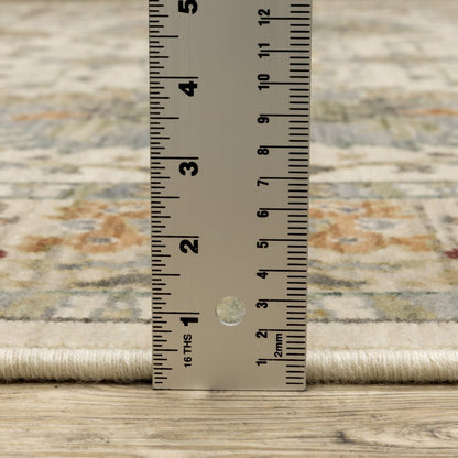 3' X 5' Ivory Grey Orange Green Blue And Red Oriental Power Loom Stain Resistant Area Rug With Fringe