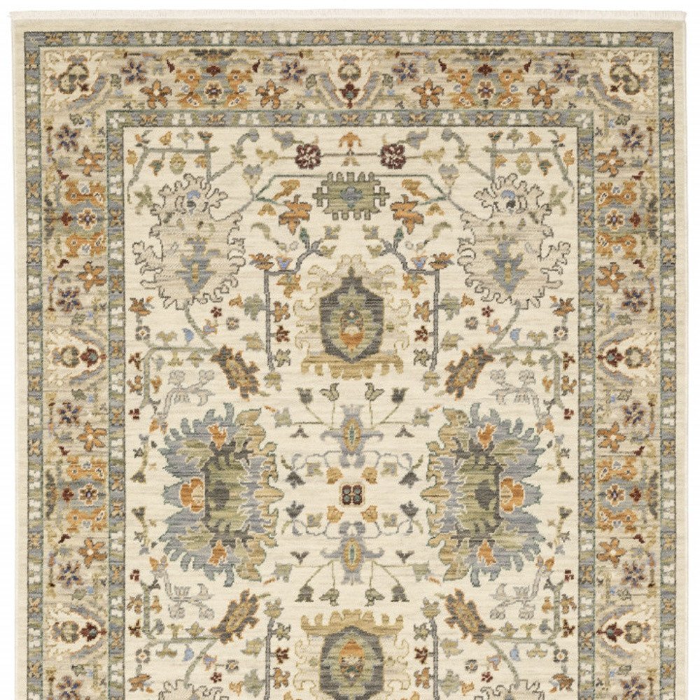 8' X 11' Ivory Oriental Power Loom Stain Resistant Area Rug With Fringe