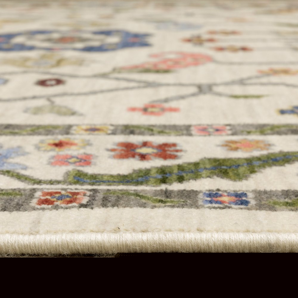 3' X 5' Ivory Green Blues Pink Yellow Rust Brown Tan And Grey Oriental Power Loom Stain Resistant Area Rug With Fringe