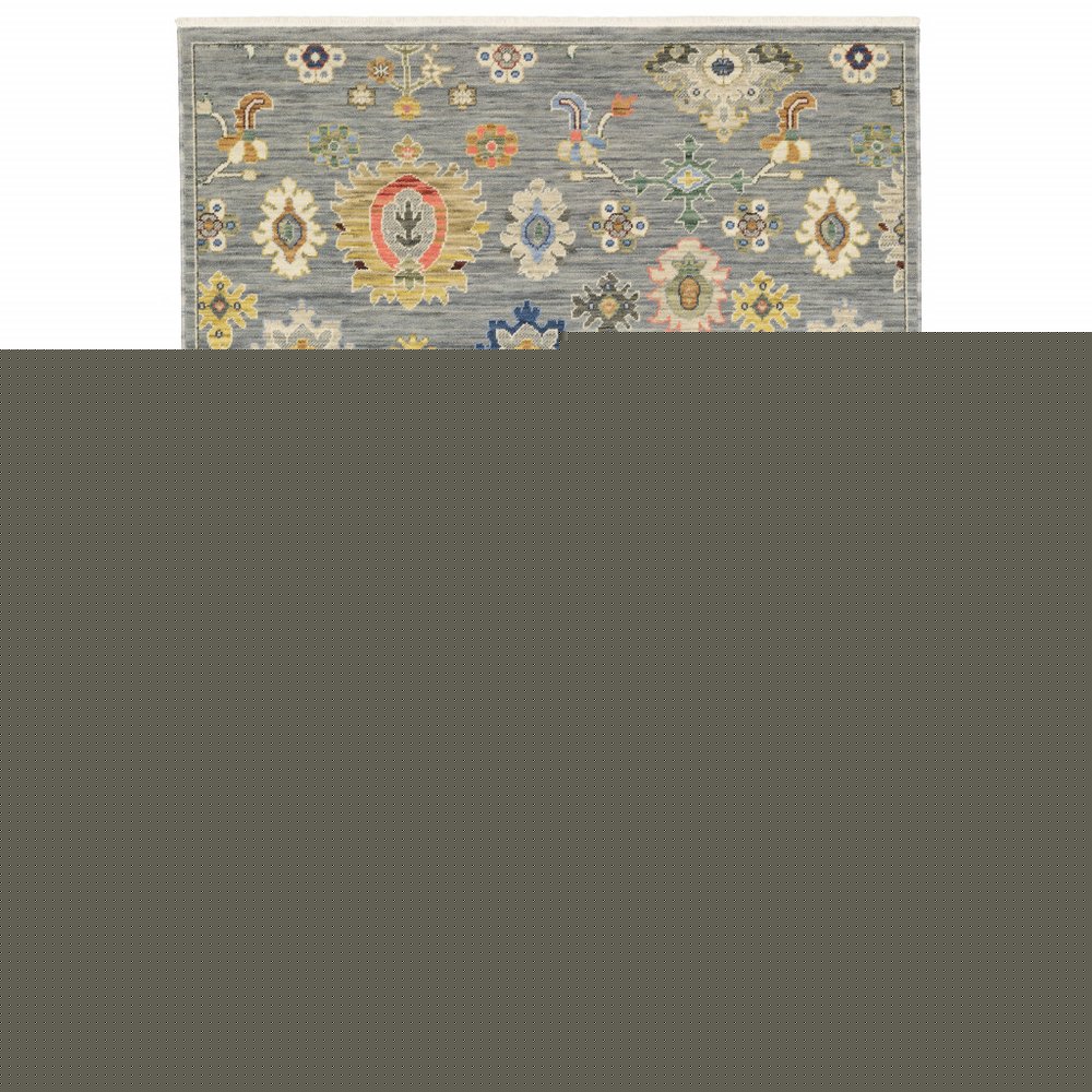 3' X 5' Grey Ivory Gold Salmon Red Blue And Green Oriental Power Loom Stain Resistant Area Rug With Fringe