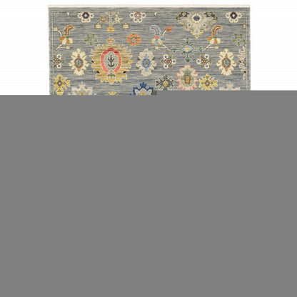 3' X 5' Grey Ivory Gold Salmon Red Blue And Green Oriental Power Loom Stain Resistant Area Rug With Fringe