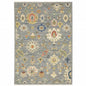 5' X 8' Grey Ivory Gold Salmon Red Blue And Green Oriental Power Loom Stain Resistant Area Rug With Fringe