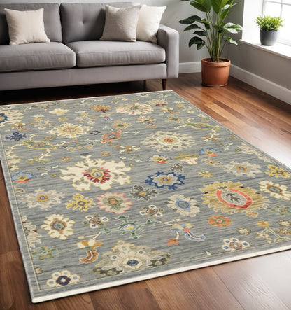 5' X 8' Gray Ivory And Blue Oriental Area Rug With Fringe