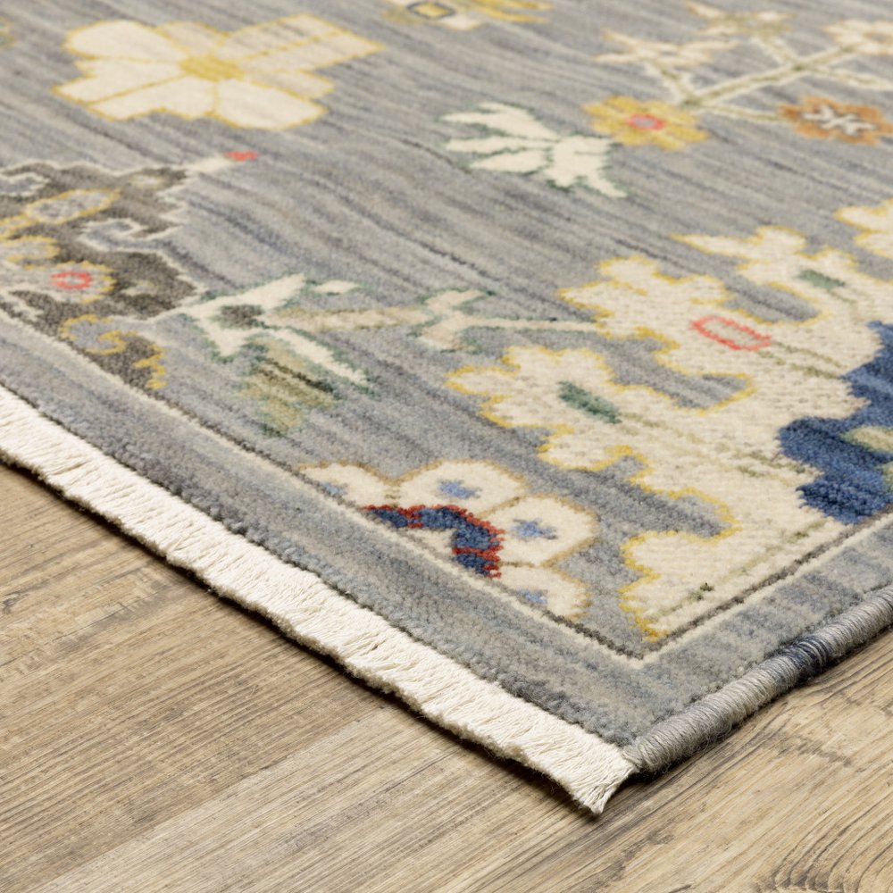 5' X 8' Gray Ivory And Blue Oriental Area Rug With Fringe