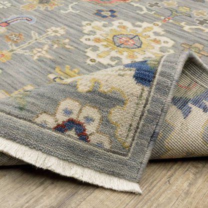 7' X 10' Gray Ivory And Blue Oriental Area Rug With Fringe