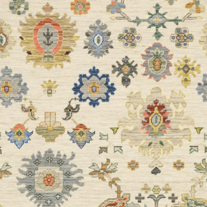 2' X 6' Ivory Beige Gold Grey Blue Pink Red Rust And Green Oriental Power Loom Stain Resistant Runner Rug With Fringe