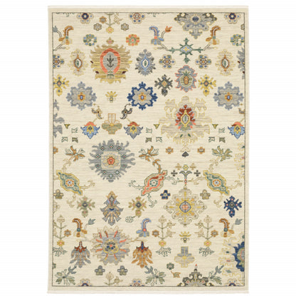 5' X 8' Ivory Beige Gold Grey Blue Pink Red Rust And Green Oriental Power Loom Stain Resistant Area Rug With Fringe