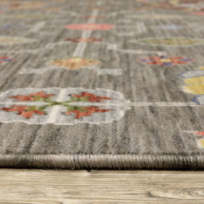 2' X 3' Grey Charcoal Yellow Blue Rust Red Pink Green And Ivory Oriental Power Loom Stain Resistant Area Rug With Fringe