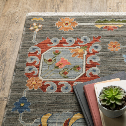 2' X 3' Grey Charcoal Yellow Blue Rust Red Pink Green And Ivory Oriental Power Loom Stain Resistant Area Rug With Fringe