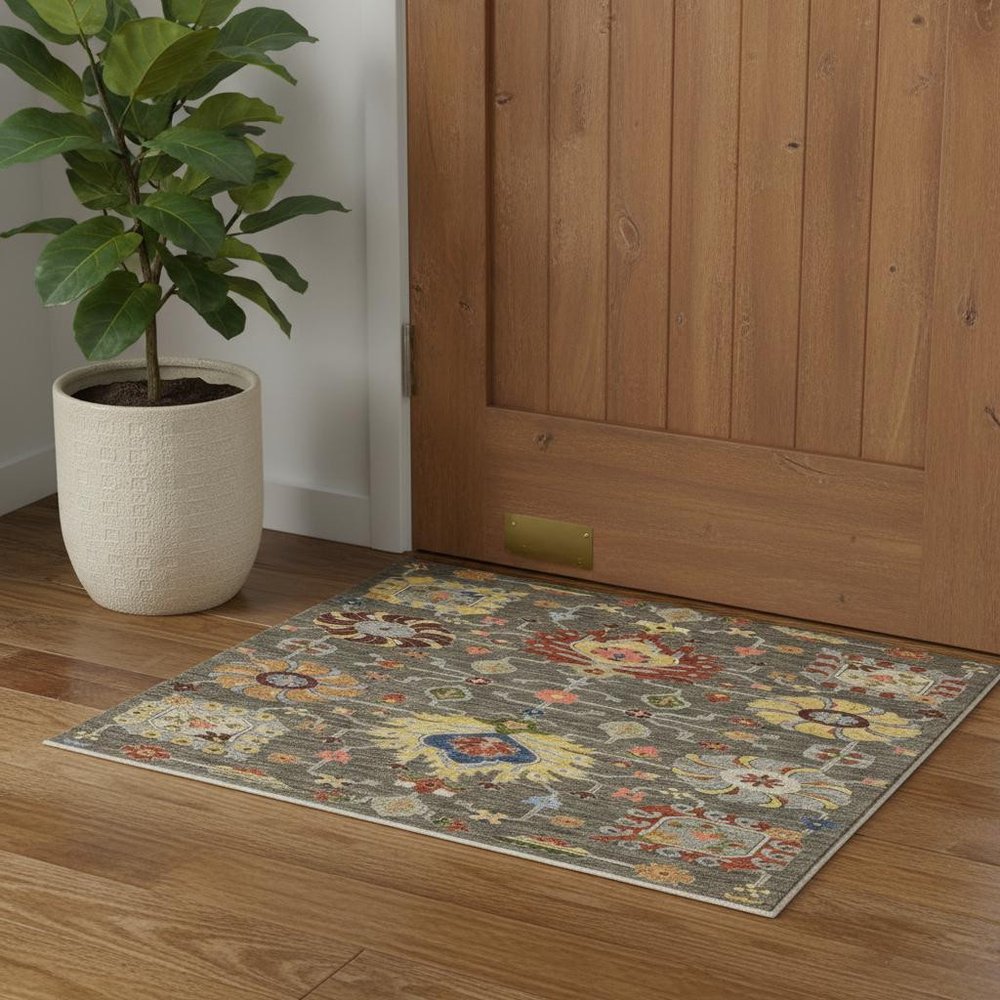 2' X 3' Grey Charcoal Yellow Blue Rust Red Pink Green And Ivory Oriental Power Loom Stain Resistant Area Rug With Fringe