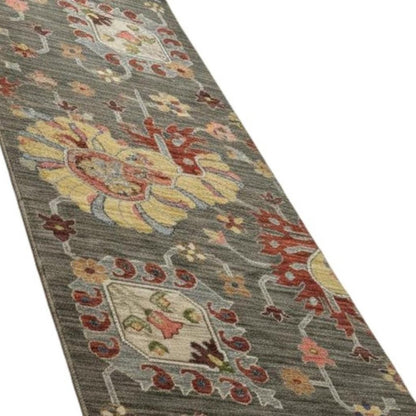 2' X 6' Grey Charcoal Yellow Blue Rust Red Pink Green And Ivory Oriental Power Loom Stain Resistant Runner Rug With Fringe