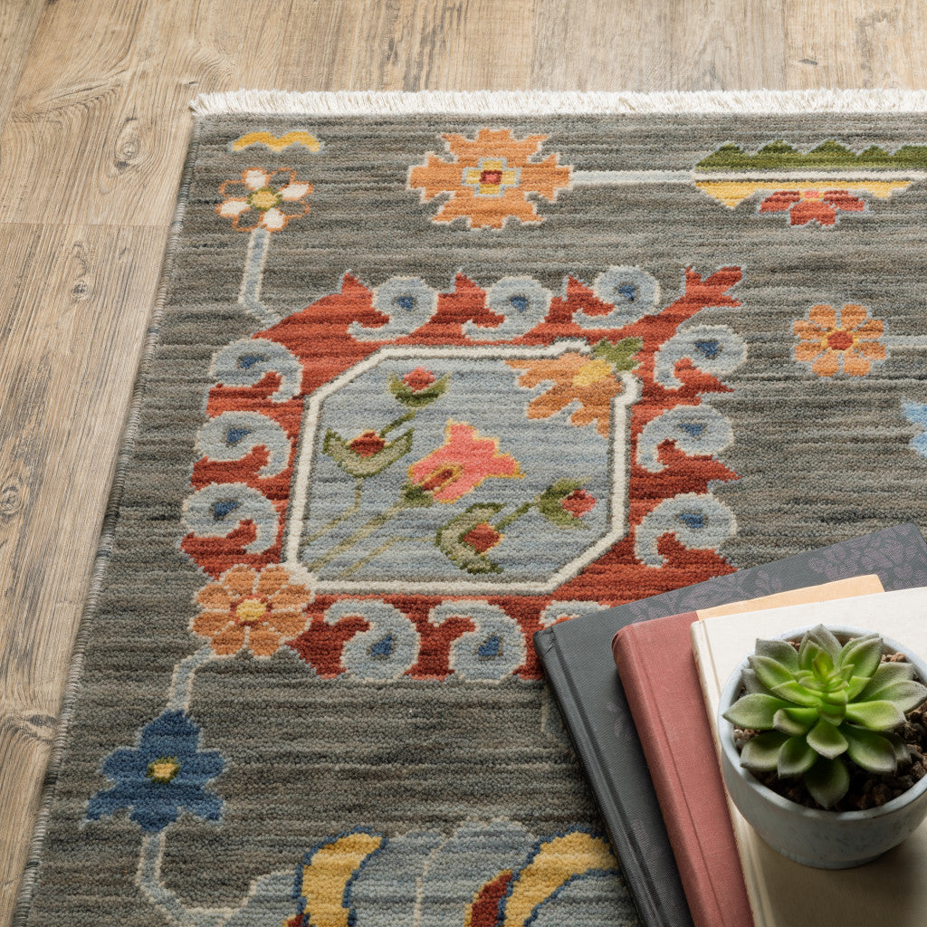 3' X 5' Grey Charcoal Yellow Blue Rust Red Pink Green And Ivory Oriental Power Loom Stain Resistant Area Rug With Fringe