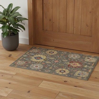 3' X 5' Grey Charcoal Yellow Blue Rust Red Pink Green And Ivory Oriental Power Loom Stain Resistant Area Rug With Fringe