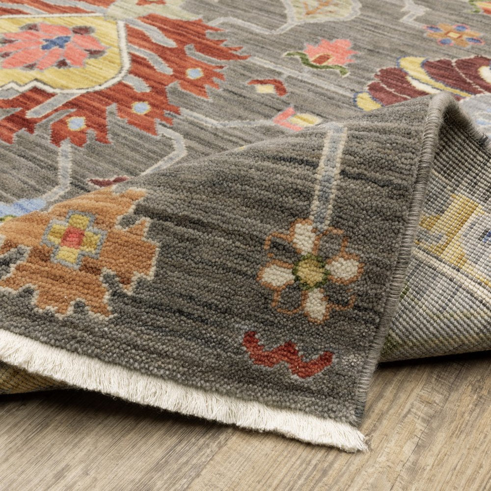 5' X 8' Gray Ivory And Red Oriental Area Rug With Fringe