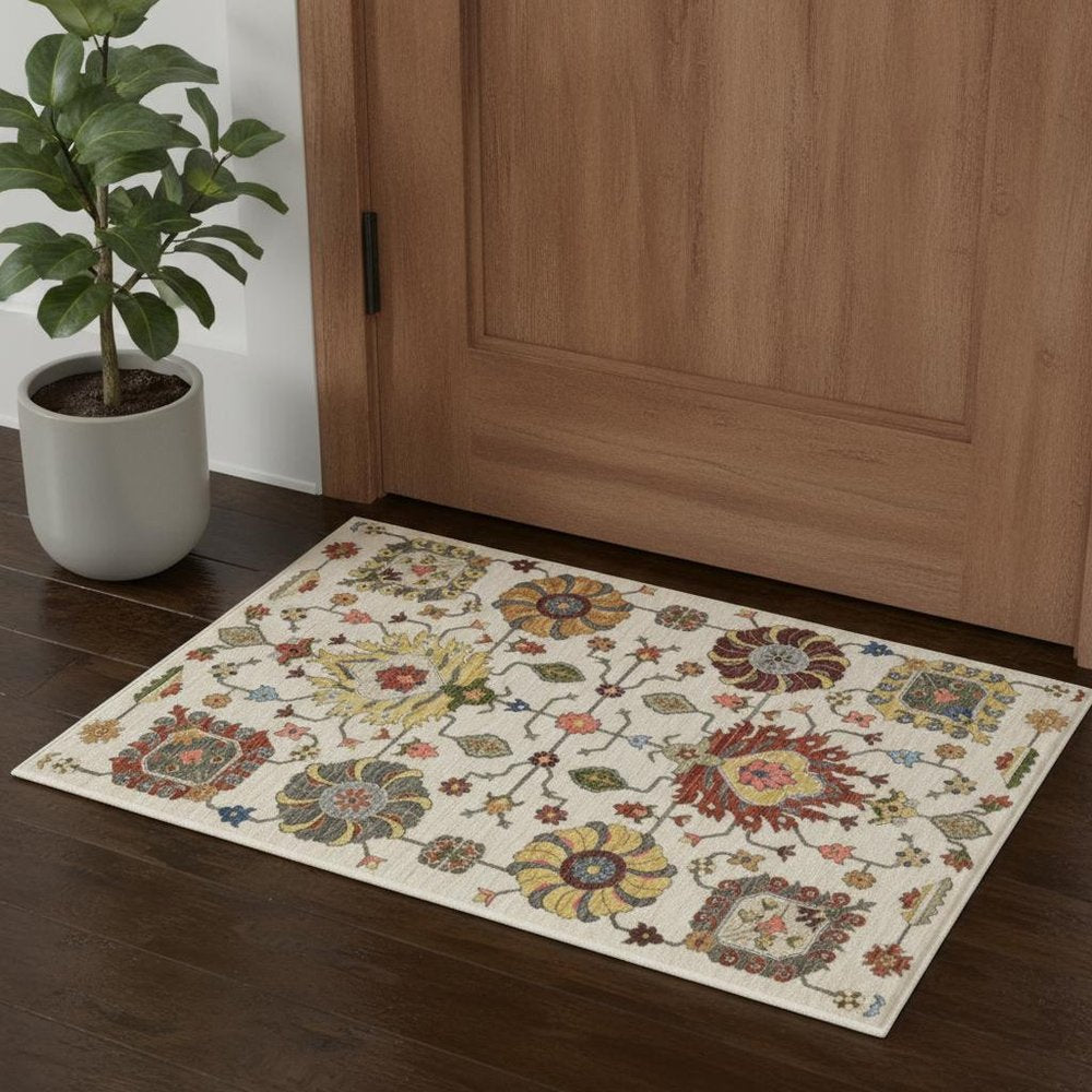 3' X 5' Ivory Yellow Rust Green Grey Pink Orange Blue And Grey Oriental Power Loom Stain Resistant Area Rug With Fringe
