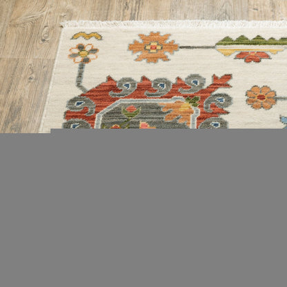 5' X 8' Ivory Blue And Red Oriental Area Rug With Fringe