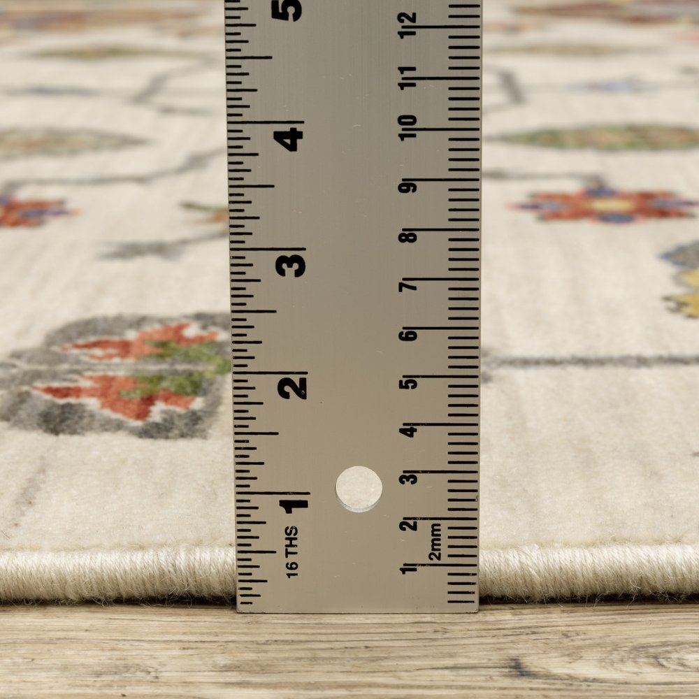 5' X 8' Ivory Blue And Red Oriental Area Rug With Fringe