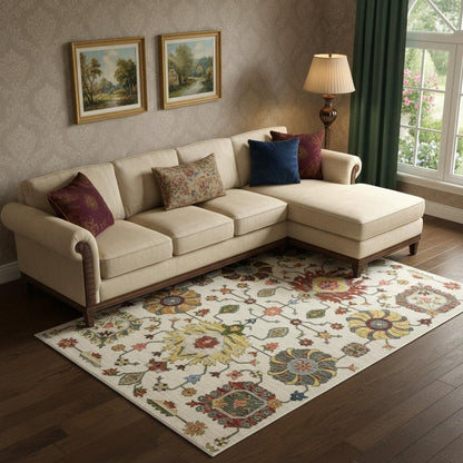 6' X 9' Ivory Yellow Rust Green Grey Pink Orange Blue And Grey Oriental Power Loom Stain Resistant Area Rug With Fringe