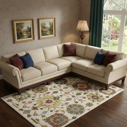 8' X 11' Ivory Yellow Rust Green Grey Pink Orange Blue And Grey Oriental Power Loom Stain Resistant Area Rug With Fringe