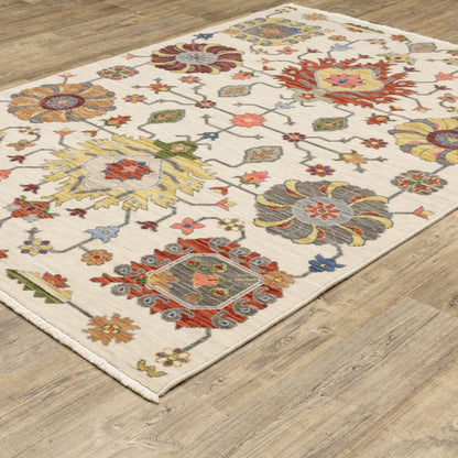 8' X 11' Ivory Yellow Rust Green Grey Pink Orange Blue And Grey Oriental Power Loom Stain Resistant Area Rug With Fringe