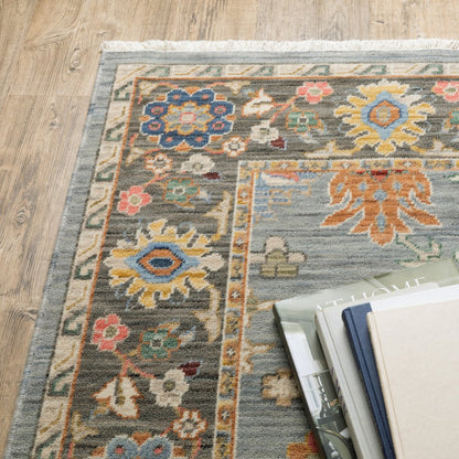 5' X 8' Blue Ivory And Red Oriental Area Rug With Fringe