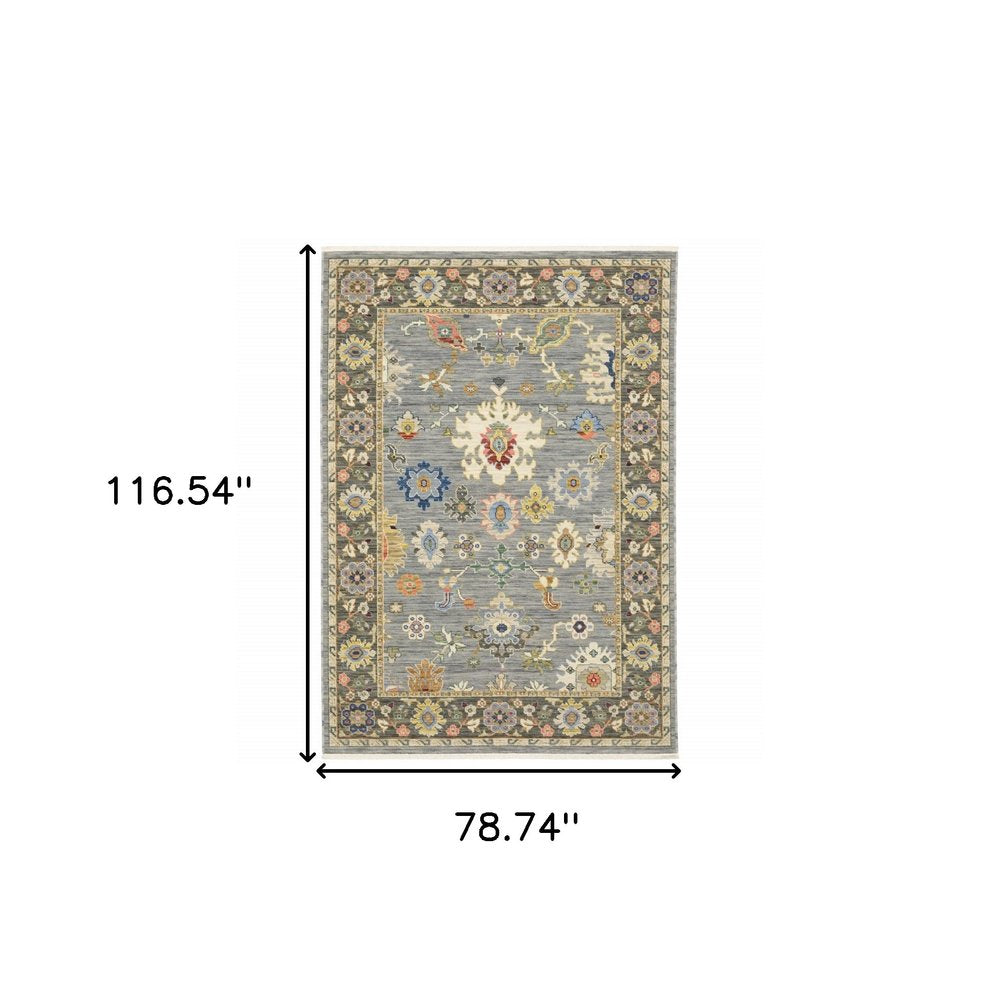 6' X 9' Blue Grey Gold Green Pink Orange Ivory And Red Oriental Power Loom Stain Resistant Area Rug With Fringe