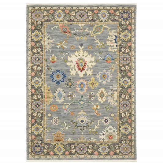 10' X 13' Blue Grey Gold Green Pink Orange Ivory And Red Oriental Power Loom Stain Resistant Area Rug With Fringe
