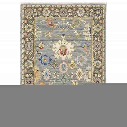 10' X 13' Blue Grey Gold Green Pink Orange Ivory And Red Oriental Power Loom Stain Resistant Area Rug With Fringe