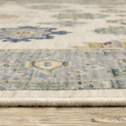 2' X 3' Ivory Blue Grey Teal Gold Green And Rust Oriental Power Loom Stain Resistant Area Rug With Fringe