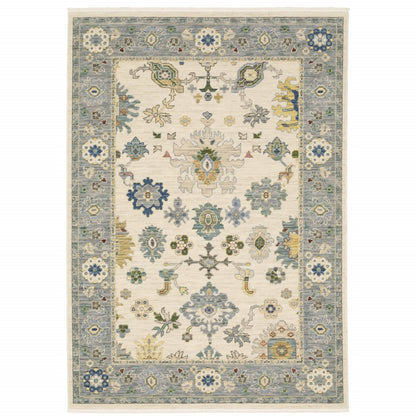 5' X 8' Ivory And Blue Oriental Area Rug With Fringe