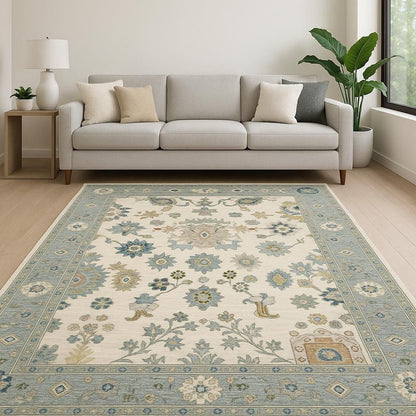 6' X 9' Ivory Blue Grey Teal Gold Green And Rust Oriental Power Loom Stain Resistant Area Rug With Fringe