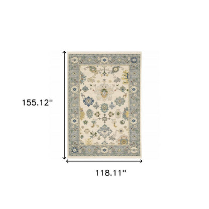 10' X 13' Ivory Blue Grey Teal Gold Green And Rust Oriental Power Loom Stain Resistant Area Rug With Fringe