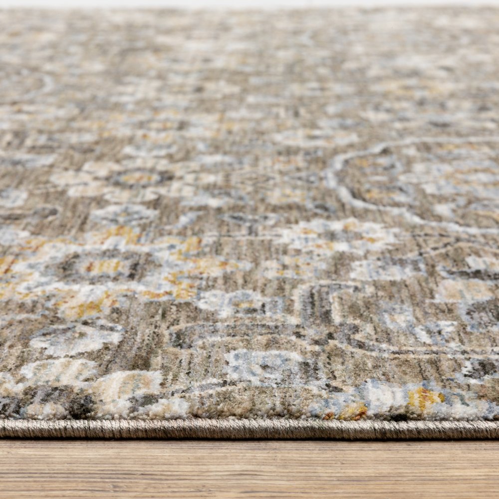 7' X 10' Gray And Gold Floral Area Rug With Fringe