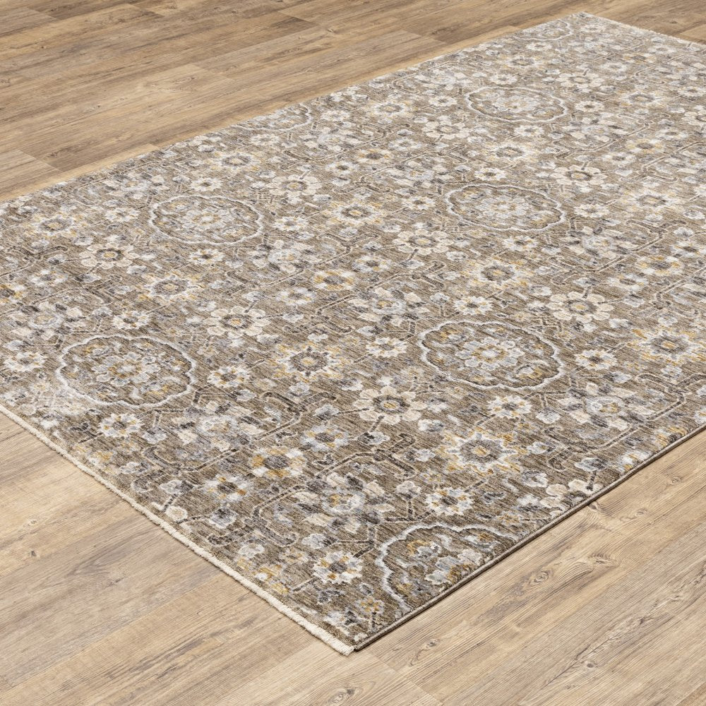 7' X 10' Gray And Gold Floral Area Rug With Fringe