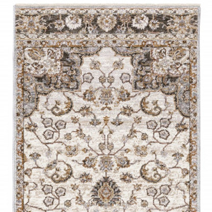 2' X 8' Ivory And Blue Oriental Power Loom Stain Resistant Runner Rug With Fringe