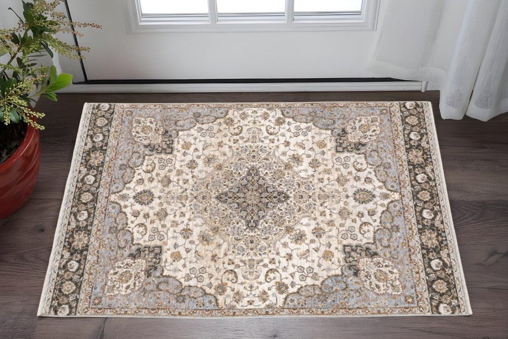 2' X 3' Ivory And Blue Oriental Power Loom Stain Resistant Area Rug With Fringe
