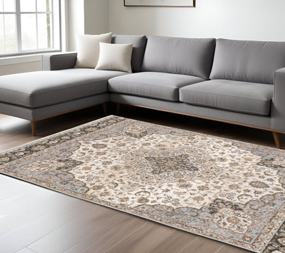 7' X 10' Ivory And Blue Oriental Area Rug With Fringe