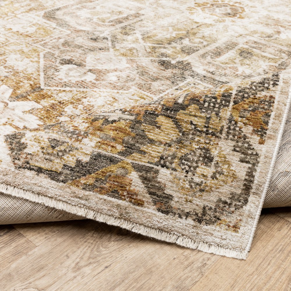 2' X 8' Gold And Ivory Oriental Power Loom Stain Resistant Runner Rug With Fringe
