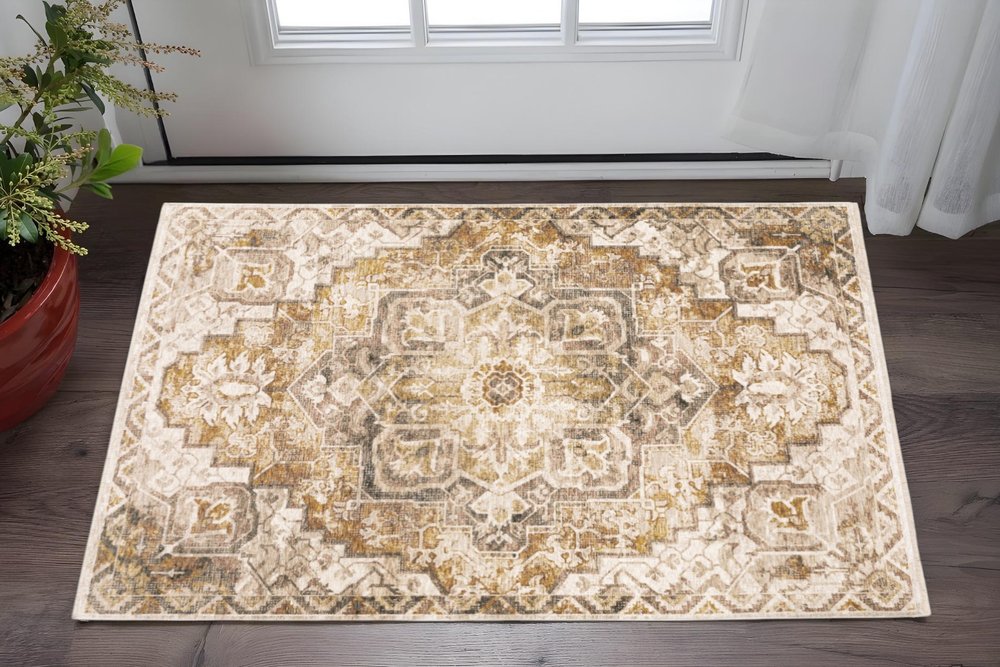 3' X 5' Gold And Ivory Oriental Power Loom Stain Resistant Area Rug With Fringe
