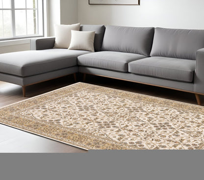 7' X 10' Ivory And Gold Oriental Area Rug With Fringe