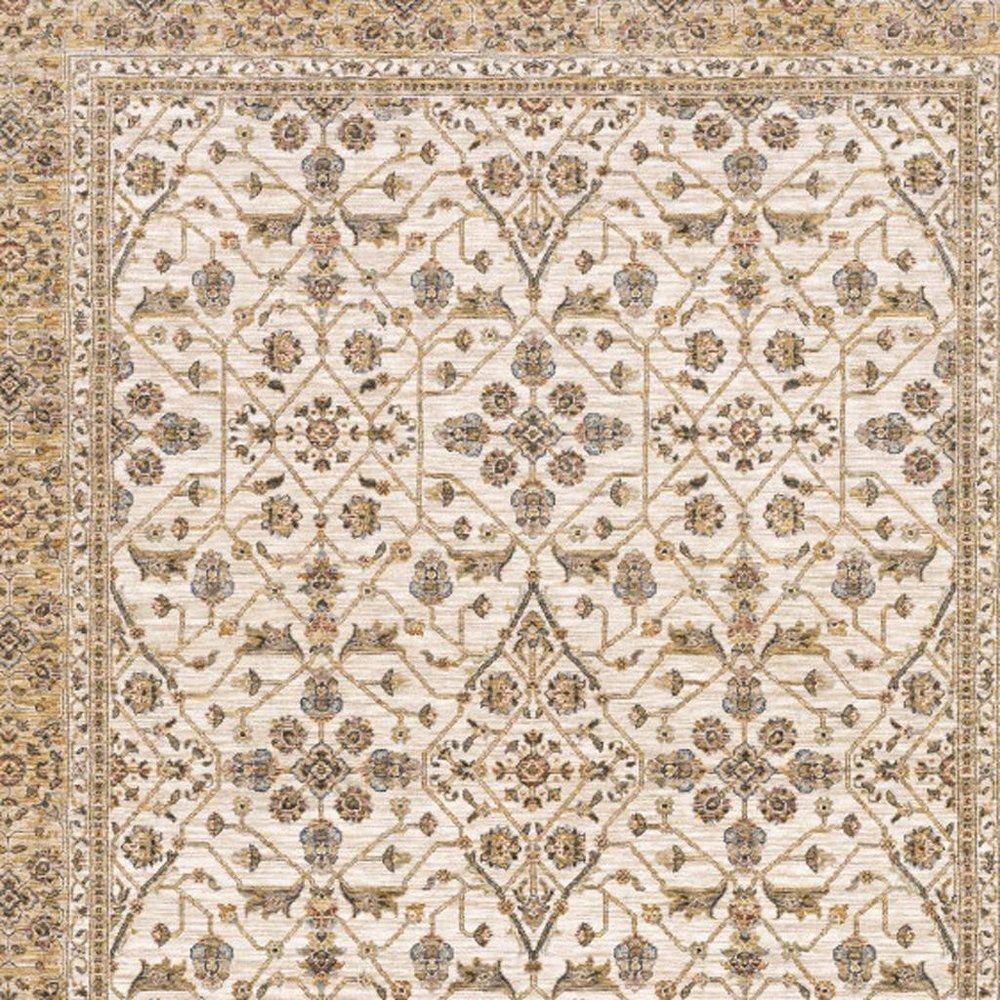 10' X 13' Ivory And Gold Oriental Power Loom Stain Resistant Area Rug With Fringe