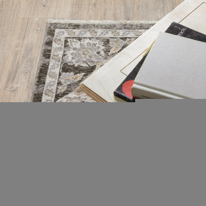 3' X 5' Grey And Ivory Oriental Power Loom Stain Resistant Area Rug With Fringe