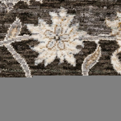 5' X 8' Grey And Ivory Oriental Power Loom Stain Resistant Area Rug With Fringe